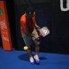 Vợt Pickleball Adidas Adipower Ctrl 3.2 PB1CA0 12 người đàn ông đang dùng vợt Người đan ông mặc áo màu cam cầm hai tay vào chiếc vợt người đàn ông đang chơi pickleball với cây vợt Adidas Adipower Ctrl 3.2 để chơi